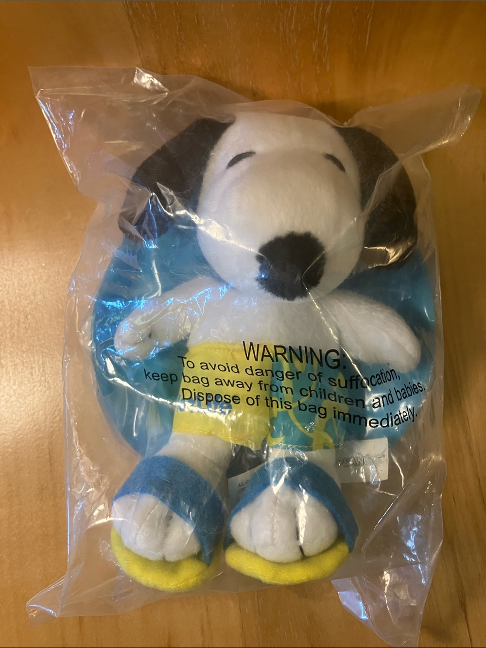 MetLife Snoopy Plush in Swim Trunks, Sandals, and an Inflatable Float.